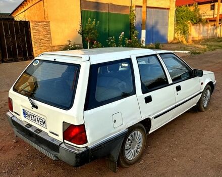 Белый Мицубиси Лансер, объемом двигателя 1.5 л и пробегом 55 тыс. км за 1500 $, фото 2 на Automoto.ua