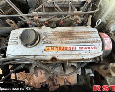 Белый Мицубиси Лансер, объемом двигателя 1.5 л и пробегом 55 тыс. км за 1500 $, фото 6 на Automoto.ua