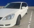 Белый Мицубиси Лансер, объемом двигателя 1.59 л и пробегом 279 тыс. км за 4500 $, фото 5 на Automoto.ua