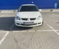 Белый Мицубиси Лансер, объемом двигателя 1.59 л и пробегом 279 тыс. км за 4500 $, фото 7 на Automoto.ua