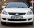 Білий Міцубісі Lancer, об'ємом двигуна 1.6 л та пробігом 370 тис. км за 5000 $, фото 1 на Automoto.ua