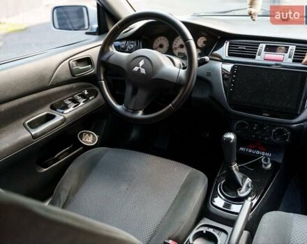 Білий Міцубісі Lancer, об'ємом двигуна 1.6 л та пробігом 370 тис. км за 5000 $, фото 18 на Automoto.ua