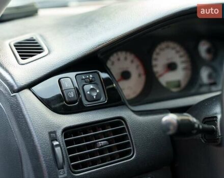 Білий Міцубісі Lancer, об'ємом двигуна 1.6 л та пробігом 370 тис. км за 5000 $, фото 11 на Automoto.ua