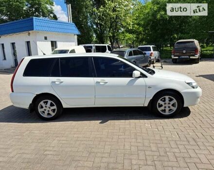 Білий Міцубісі Lancer, об'ємом двигуна 1.58 л та пробігом 200 тис. км за 5499 $, фото 4 на Automoto.ua