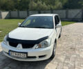 Білий Міцубісі Lancer, об'ємом двигуна 1.6 л та пробігом 147 тис. км за 3100 $, фото 1 на Automoto.ua