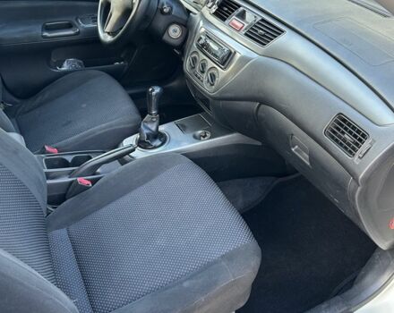 Мицубиси Лансер 2008 в Ивано-Франковске на Automoto.ua Белый Мицубиси Лансер, объемом двигателя 1.6 л и пробегом 147 тыс. км за 3800 $, фото 5 на Automoto.ua