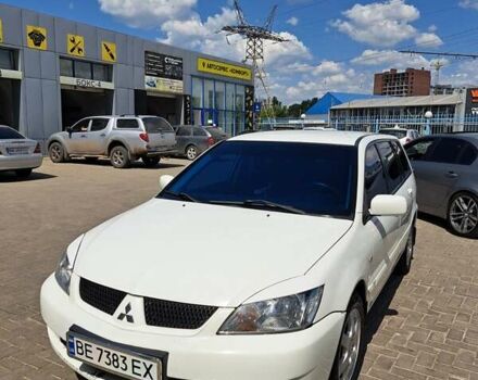 Білий Міцубісі Lancer, об'ємом двигуна 1.58 л та пробігом 200 тис. км за 5499 $, фото 2 на Automoto.ua