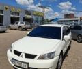 Білий Міцубісі Lancer, об'ємом двигуна 1.58 л та пробігом 200 тис. км за 5499 $, фото 2 на Automoto.ua