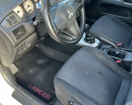 Мицубиси Лансер 2008 в Ивано-Франковске на Automoto.ua Белый Мицубиси Лансер, объемом двигателя 1.6 л и пробегом 147 тыс. км за 3800 $, фото 9 на Automoto.ua