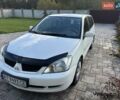 Мицубиси Лансер 2008 в Ивано-Франковске на Automoto.ua Белый Мицубиси Лансер, объемом двигателя 1.6 л и пробегом 147 тыс. км за 3800 $, фото 13 на Automoto.ua