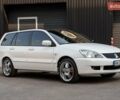 Білий Міцубісі Lancer, об'ємом двигуна 1.6 л та пробігом 370 тис. км за 5000 $, фото 1 на Automoto.ua