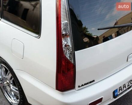 Білий Міцубісі Lancer, об'ємом двигуна 1.6 л та пробігом 370 тис. км за 5000 $, фото 9 на Automoto.ua