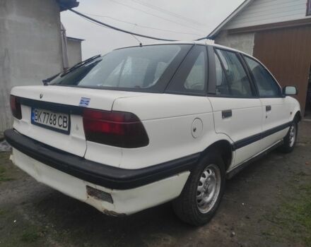 Білий Міцубісі Lancer, об'ємом двигуна 1.5 л та пробігом 240 тис. км за 850 $, фото 1 на Automoto.ua