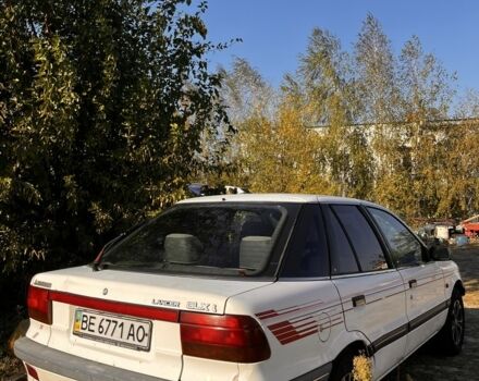 Білий Міцубісі Lancer, об'ємом двигуна 1.8 л та пробігом 350 тис. км за 2100 $, фото 3 на Automoto.ua