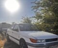 Білий Міцубісі Lancer, об'ємом двигуна 1.8 л та пробігом 350 тис. км за 2100 $, фото 1 на Automoto.ua
