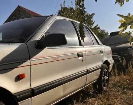 Білий Міцубісі Lancer, об'ємом двигуна 1.8 л та пробігом 350 тис. км за 2100 $, фото 5 на Automoto.ua