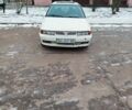 Белый Мицубиси Лансер, объемом двигателя 1.3 л и пробегом 449 тыс. км за 1200 $, фото 1 на Automoto.ua