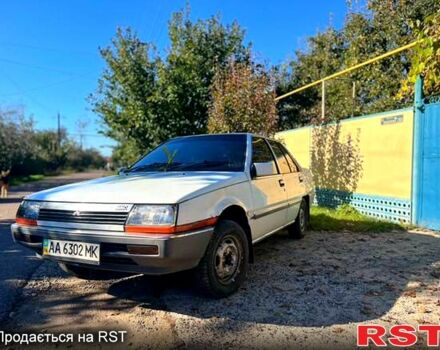 Белый Мицубиси Лансер, объемом двигателя 1.5 л и пробегом 0 тыс. км за 350 $, фото 1 на Automoto.ua