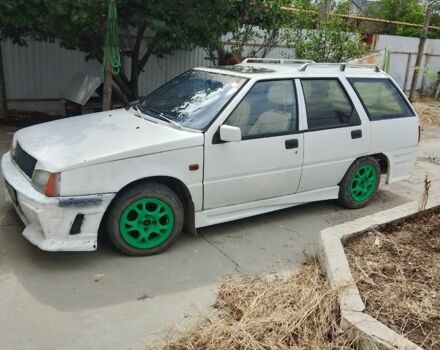 Білий Міцубісі Lancer, об'ємом двигуна 1.5 л та пробігом 280 тис. км за 601 $, фото 1 на Automoto.ua