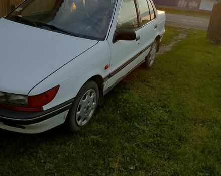 Білий Міцубісі Lancer, об'ємом двигуна 1.5 л та пробігом 300 тис. км за 1300 $, фото 1 на Automoto.ua