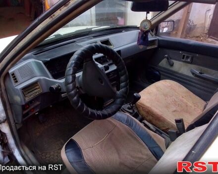 Білий Міцубісі Lancer, об'ємом двигуна 1.5 л та пробігом 290 тис. км за 1200 $, фото 1 на Automoto.ua