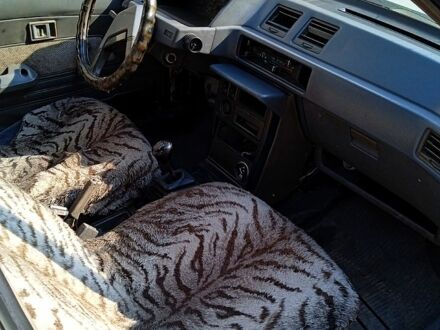 Мицубиси Лансер 1987 в Запорожье на Automoto.ua Белый Мицубиси Лансер, объемом двигателя 1.8 л и пробегом 270 тыс. км за 520 $, фото 1 на Automoto.ua