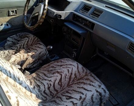 Білий Міцубісі Lancer, об'ємом двигуна 1.8 л та пробігом 270 тис. км за 520 $, фото 1 на Automoto.ua