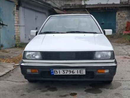 Белый Мицубиси Лансер, объемом двигателя 1.46 л и пробегом 250 тыс. км за 1300 $, фото 1 на Automoto.ua