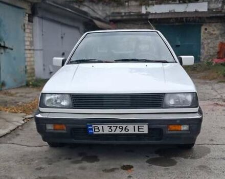 Белый Мицубиси Лансер, объемом двигателя 1.46 л и пробегом 250 тыс. км за 1300 $, фото 1 на Automoto.ua