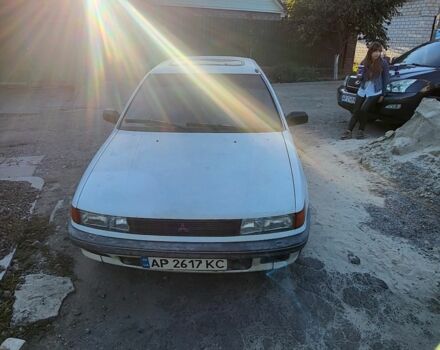 Белый Мицубиси Лансер, объемом двигателя 1.5 л и пробегом 300 тыс. км за 1300 $, фото 1 на Automoto.ua