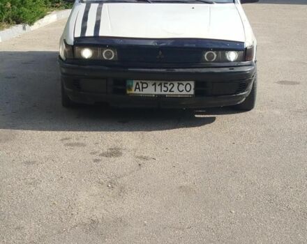 Білий Міцубісі Lancer, об'ємом двигуна 1.5 л та пробігом 1 тис. км за 765 $, фото 1 на Automoto.ua