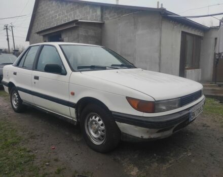 Білий Міцубісі Lancer, об'ємом двигуна 1.5 л та пробігом 240 тис. км за 700 $, фото 1 на Automoto.ua