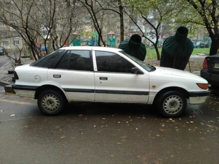 Білий Міцубісі Lancer, об'ємом двигуна 1.8 л та пробігом 86 тис. км за 750 $, фото 1 на Automoto.ua