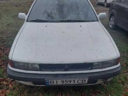 Белый Мицубиси Лансер, объемом двигателя 1.5 л и пробегом 400 тыс. км за 1300 $, фото 1 на Automoto.ua