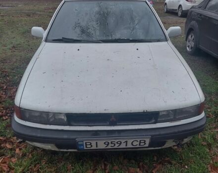 Білий Міцубісі Lancer, об'ємом двигуна 1.5 л та пробігом 400 тис. км за 1300 $, фото 1 на Automoto.ua