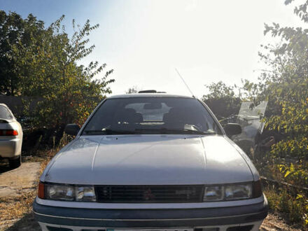 Міцубісі Lancer 1991 у Миколаєві на Automoto.ua Білий Міцубісі Lancer, об'ємом двигуна 1.8 л та пробігом 400 тис. км за 3200 $, фото 1 на Automoto.ua