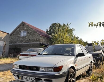 Белый Мицубиси Лансер, объемом двигателя 1.8 л и пробегом 350 тыс. км за 2100 $, фото 1 на Automoto.ua