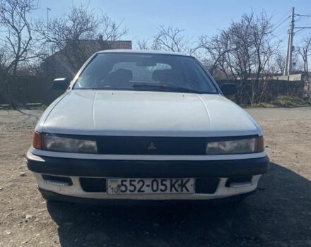 Білий Міцубісі Lancer, об'ємом двигуна 1.5 л та пробігом 250 тис. км за 1100 $, фото 1 на Automoto.ua