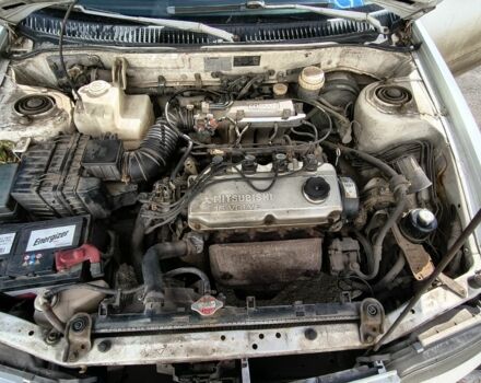 Белый Мицубиси Лансер, объемом двигателя 0 л и пробегом 400 тыс. км за 850 $, фото 1 на Automoto.ua