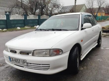 Білий Міцубісі Lancer, об'ємом двигуна 1.3 л та пробігом 300 тис. км за 1700 $, фото 1 на Automoto.ua