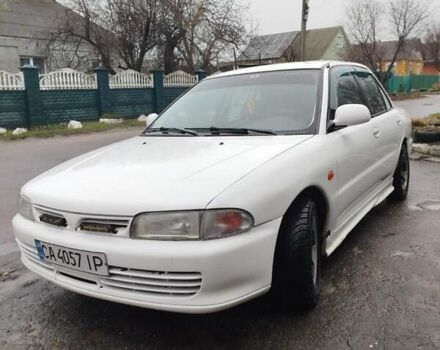 Білий Міцубісі Lancer, об'ємом двигуна 1.3 л та пробігом 300 тис. км за 1700 $, фото 1 на Automoto.ua