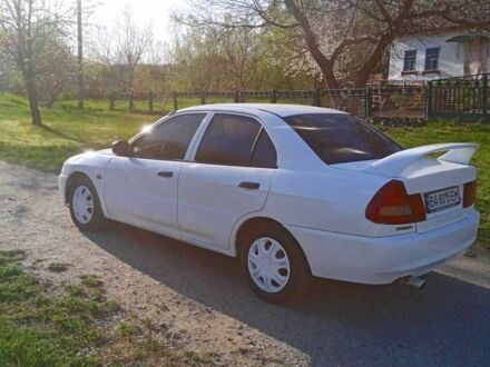 Мицубиси Лансер 1996 в Бершаде на Automoto.ua Белый Мицубиси Лансер, объемом двигателя 1.3 л и пробегом 234 тыс. км за 1450 $, фото 1 на Automoto.ua