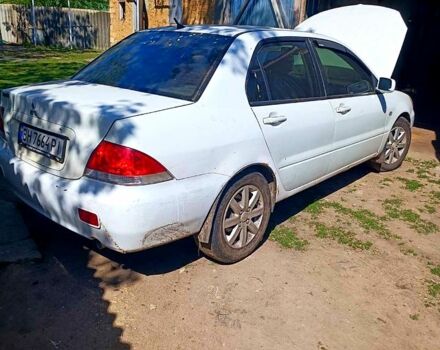 Білий Міцубісі Lancer, об'ємом двигуна 1.6 л та пробігом 1 тис. км за 3000 $, фото 1 на Automoto.ua