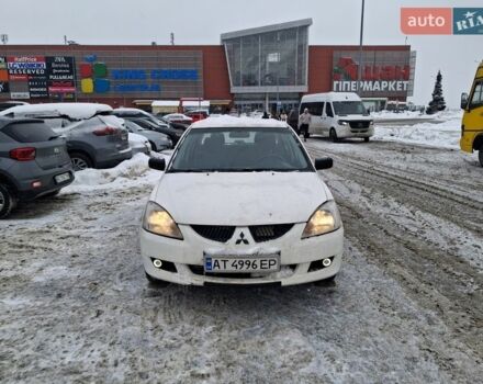 Белый Мицубиси Лансер, объемом двигателя 1.6 л и пробегом 333 тыс. км за 2500 $, фото 1 на Automoto.ua