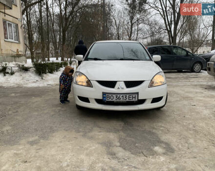 Белый Мицубиси Лансер, объемом двигателя 1.58 л и пробегом 213 тыс. км за 4000 $, фото 1 на Automoto.ua