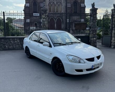 Белый Мицубиси Лансер, объемом двигателя 1.6 л и пробегом 5 тыс. км за 3499 $, фото 1 на Automoto.ua