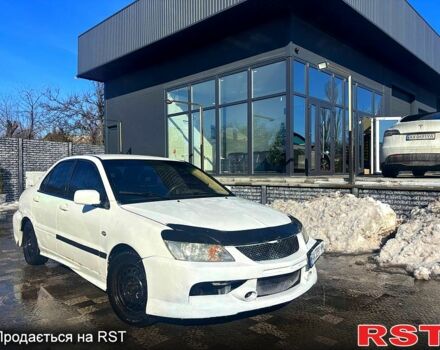 Белый Мицубиси Лансер, объемом двигателя 1.6 л и пробегом 360 тыс. км за 3600 $, фото 1 на Automoto.ua