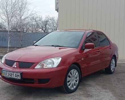 Белый Мицубиси Лансер, объемом двигателя 1.6 л и пробегом 160 тыс. км за 4750 $, фото 1 на Automoto.ua