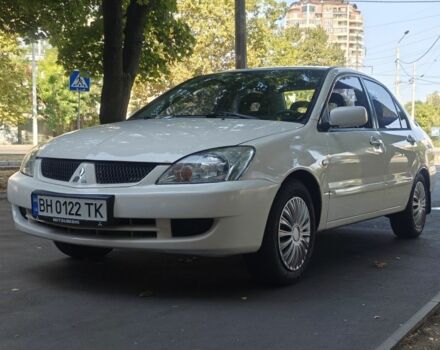 Білий Міцубісі Lancer, об'ємом двигуна 1.6 л та пробігом 400 тис. км за 4200 $, фото 1 на Automoto.ua