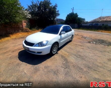 Мицубиси Лансер 2006 в Днепре (Днепропетровске) на Automoto.ua Белый Мицубиси Лансер, объемом двигателя 1.6 л и пробегом 296 тыс. км за 3500 $, фото 1 на Automoto.ua
